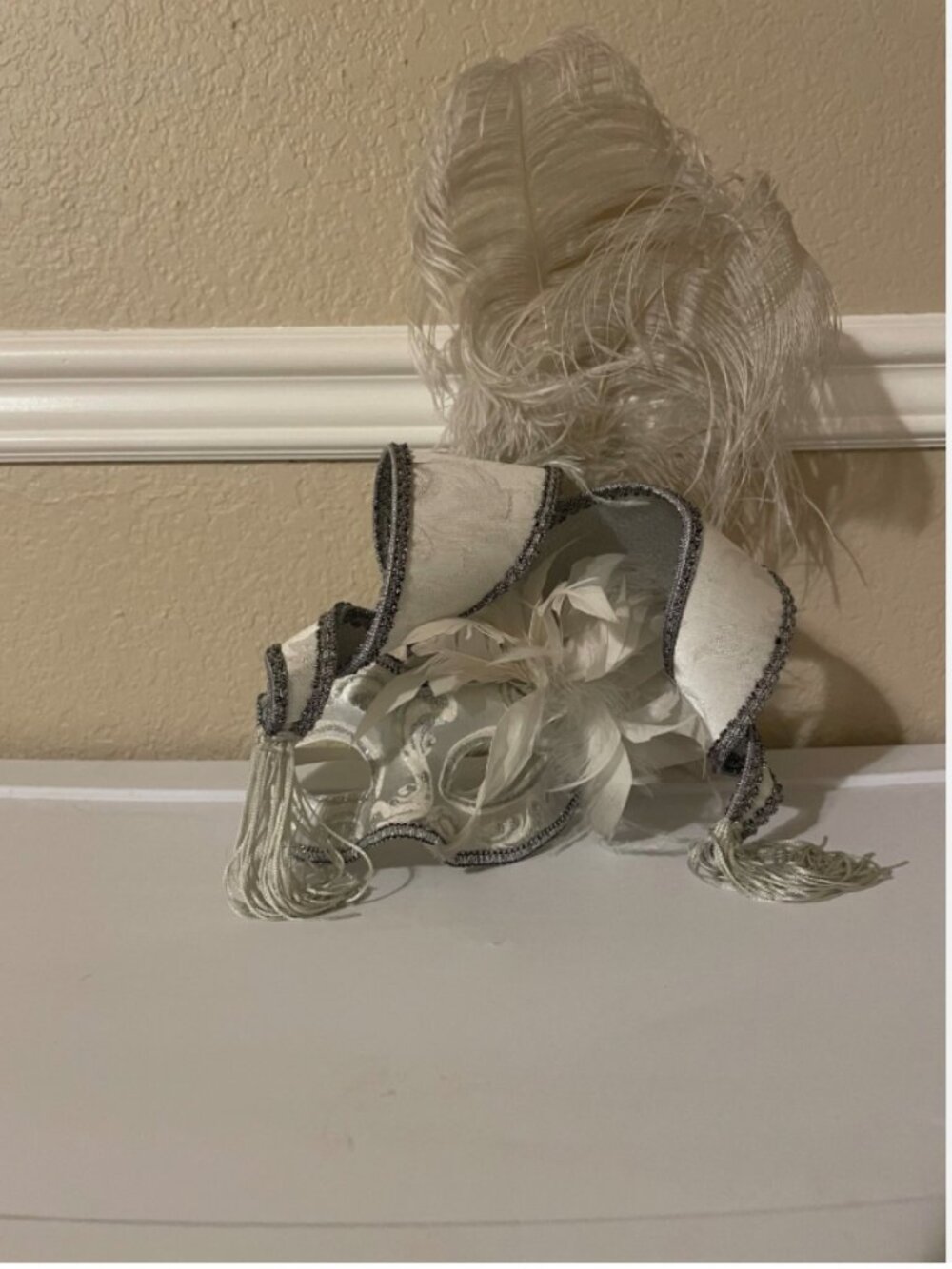White venetian mask made in italy with feathers